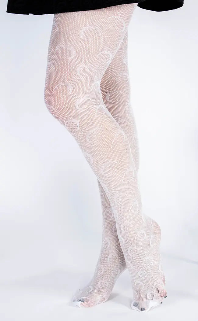 Rodarte New York Ready to Wear Autumn Winter White broken fishnet tights,  white shoes with multiple straps spikes and studs Stock Photo - Alamy